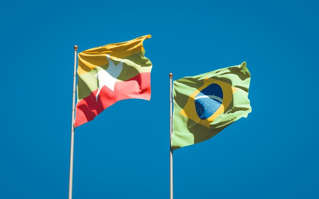 Schöne Nationalstaatsflaggen von Myanmar und Brasilien zusammen auf blauem Himmel