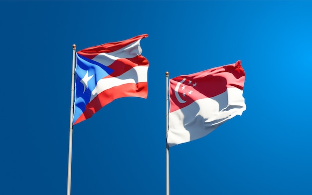 Schöne Nationalstaatsflaggen von Puerto Rico und Singapur zusammen