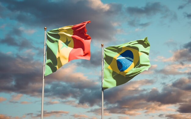 Schöne Nationalstaatsflaggen von Senegal und Brasilien zusammen auf blauem Himmel