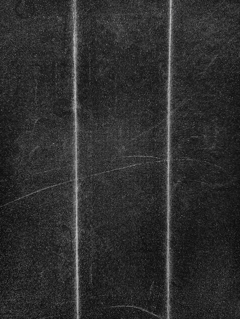 Schöne schwarze, grunge gefaltete Textur, gefaltetes Papier, Hintergrundstaub, alte, gefaltete Pappe.