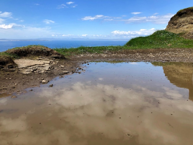 Foto schöner blick auf den strand gegen den himmel