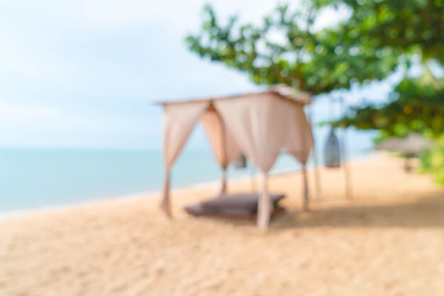 Foto schöner pavillon der abstrakten unschärfe auf strand