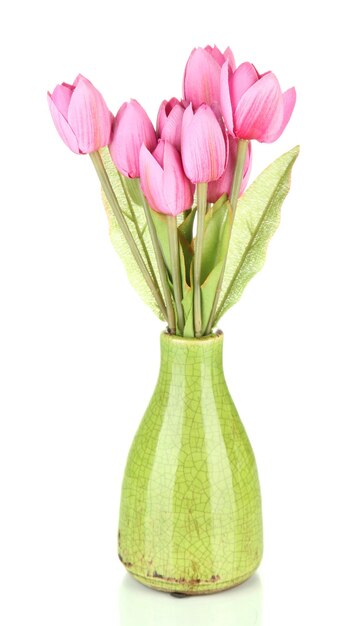 Schöner Strauß rosa Tulpen in Vase, isoliert auf weiß