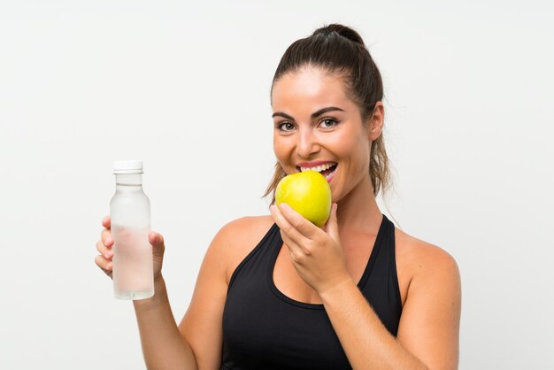 Schönes junges Mädchen mit einem Apfel