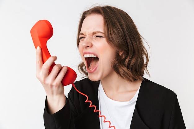 Foto schreiende aggressive junge frau