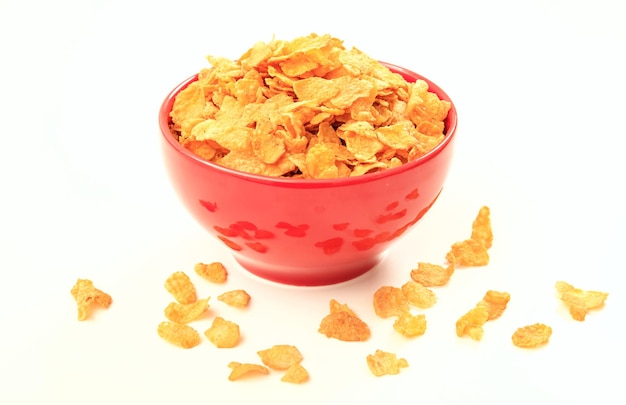 Schüssel mit Cornflakes auf weißem Hintergrund