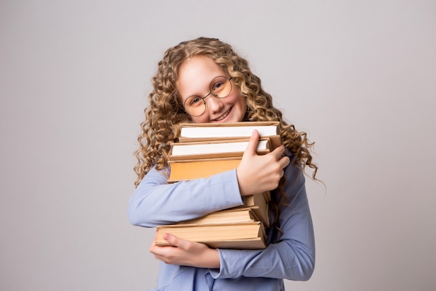 Schulmädchen mit Büchern