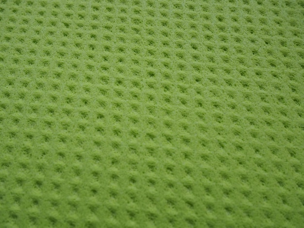 Schwammfasern Schwamm Textur Muster Oberfläche Nahaufnahme grün gelber Hintergrund
