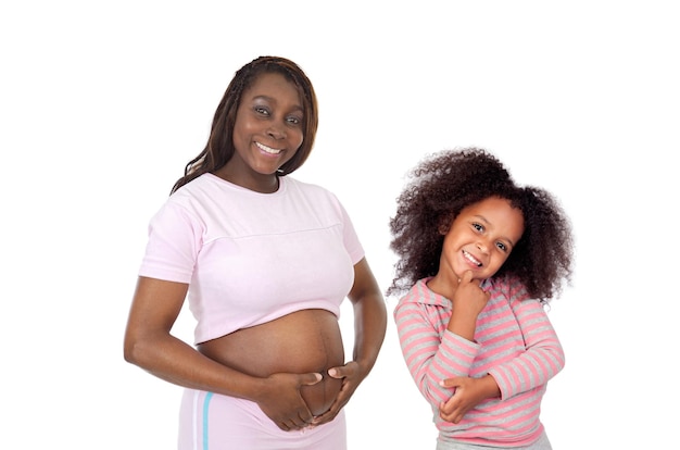 Schwangerschaft afrikanerin mit ihrer tochter, die auf das baby wartet
