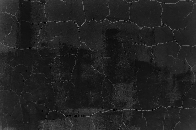 schwarze alte Mauer rissiger Betonhintergrund / abstrakte schwarze Textur, alter Hintergrund der Weinlese