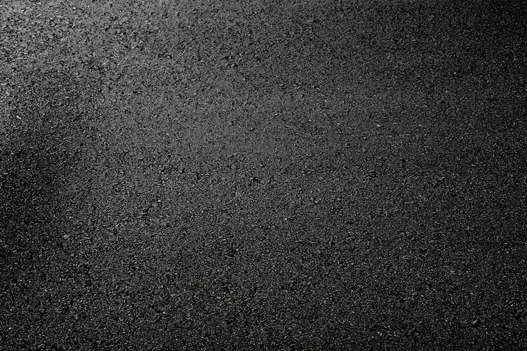 Schwarze Asphaltstraßebeschaffenheit - Hintergrund