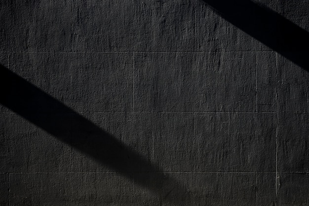 Foto schwarze betonmauer mit schatten