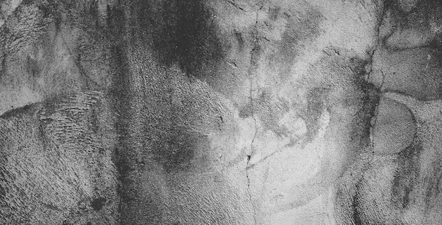 Schwarze Betonwand oder dunkelgrauer, rauer, körniger Steintexturhintergrund