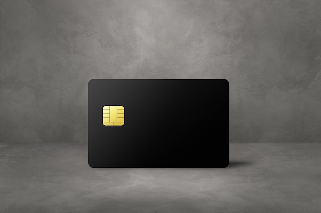 Schwarze Kreditkarte auf einem konkreten Hintergrund
