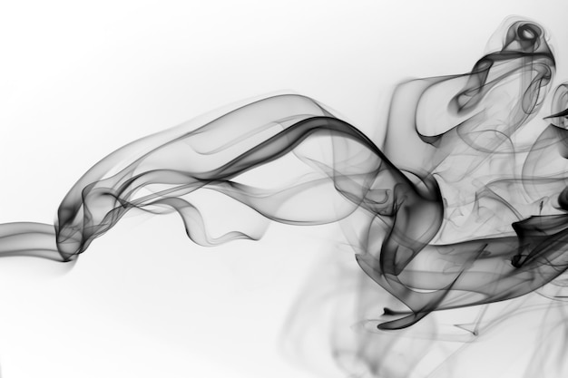 Schwarze Rauchbewegung abstrakt auf weißem Hintergrund Bewegung des Feuerdesigns