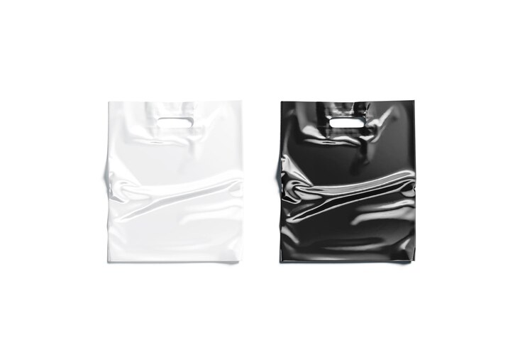 Foto schwarze und weiße plastiktüte mit griffloch polyethylenverpackung für den einkauf