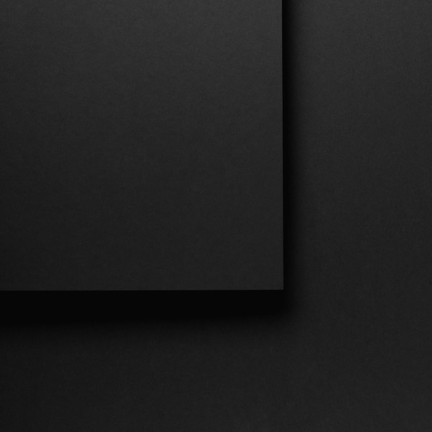 Schwarzer abstrakter strukturierter Papierhintergrund
