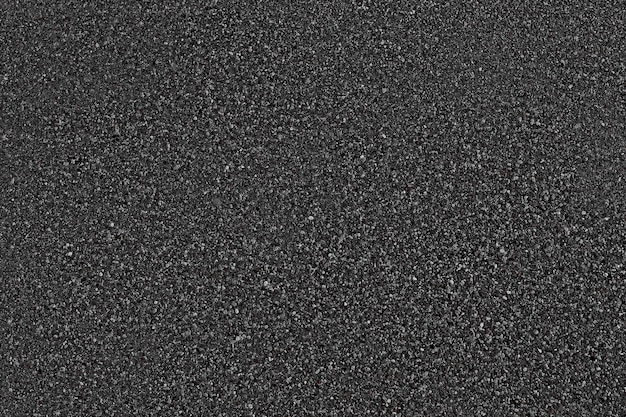 Schwarzer Asphaltbeschaffenheitshintergrund. Ansicht von oben.