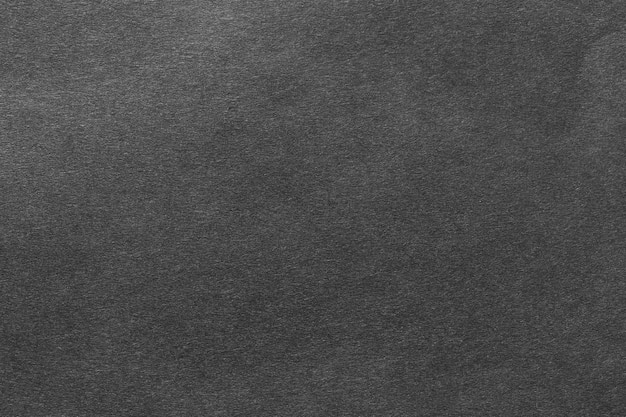 Schwarzer Papierblattstruktur-Kartonhintergrund