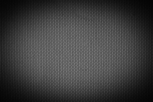 Schwarzer Wandbeschaffenheit rauer Hintergrund dunkel. Grunge Hintergrund mit schwarz. Vignette.