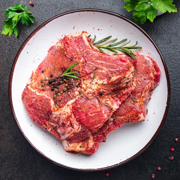 Schweinefleisch rohes Steak Fleisch Rindfleisch frische Mahlzeit Essen Diät Snack auf dem Tisch Kopie Raum Essen Hintergrund