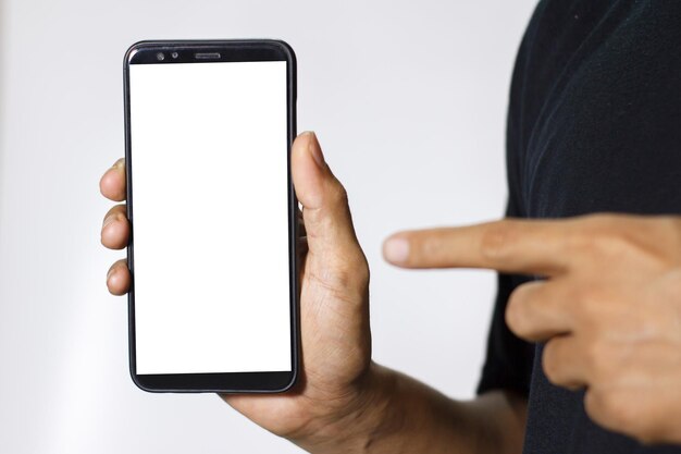 Foto seção média de um homem usando um telefone móvel