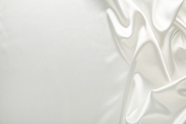Foto seda branca elegante e lisa pode ser usada como plano de fundo.