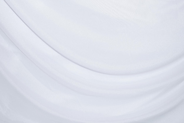 Seda branca elegante suave ou textura de pano de luxo de cetim pode usar como fundo de casamento Design de fundo luxuoso