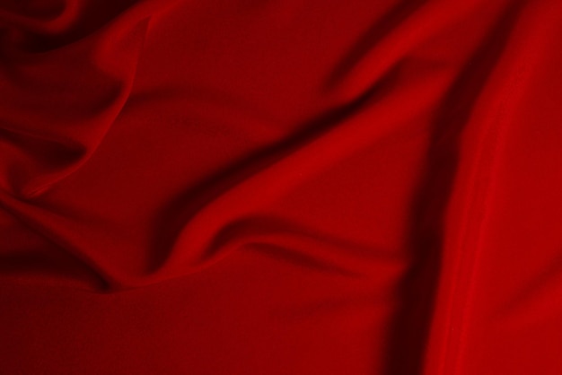 Seda vermelha ou textura de tecido de luxo de cetim pode usar como fundo abstrato vista superior
