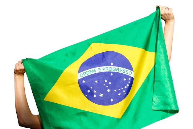 Segurando a bandeira brasileira ao vento