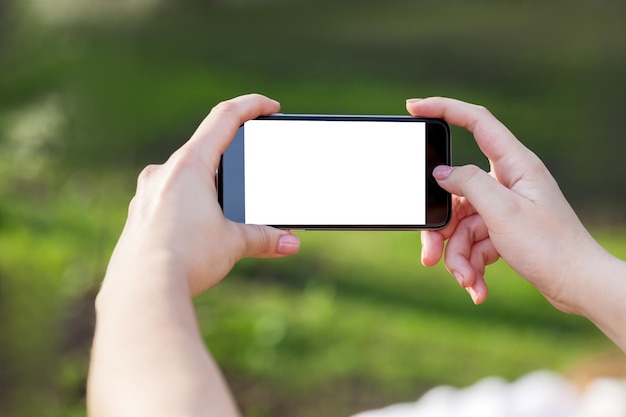 Segure a mão e telefone inteligente com tela sensível ao toque