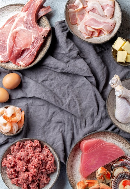 Foto selección de alimentos para la dieta carnívora mariscos carnes y grasas concepto de dieta sin carbohidratos
