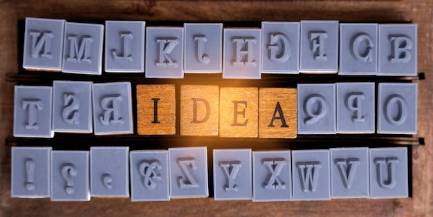 Sello de madera con la palabra IDEA Business ideacreative pensamiento idea concepto