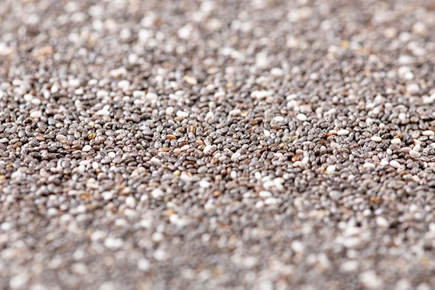 Sementes de Chia em uma colher de pau. Superalimento, conceito saudável