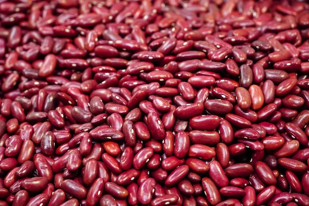 Semillas de frijoles rojos Proteínas de alimentos vegetales Una dieta saludable Cereales saludables frescos orgánicos en ensaladas con alto contenido de fibra Granos enteros saludables Alto contenido de calcio Nutren los huesos y los dientes