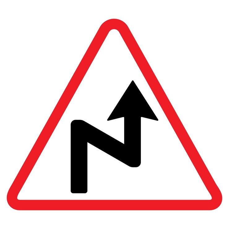 Foto señal de advertencia de curva inversa a la izquierda triángulo rojo flecha negra símbolo de tráfico señal de carretera de advertencia