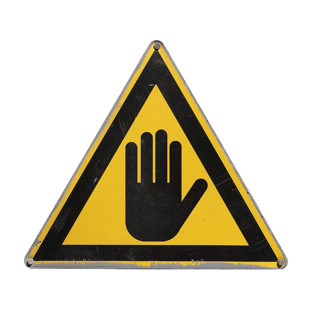 Foto señal de mano parada advertencia peligro triángulo amarillo aislado
