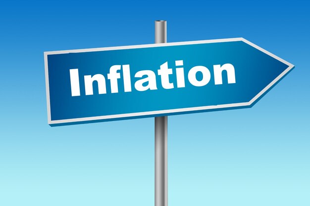 Señal de tráfico azul con la palabra inflación