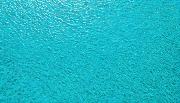 Foto la serena textura turquesa del agua del océano