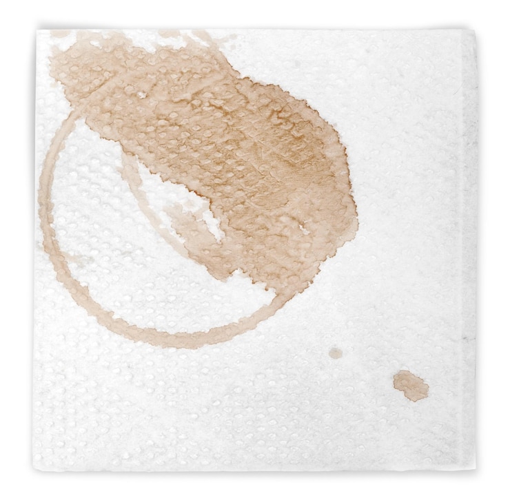 Foto servilleta con manchas de café