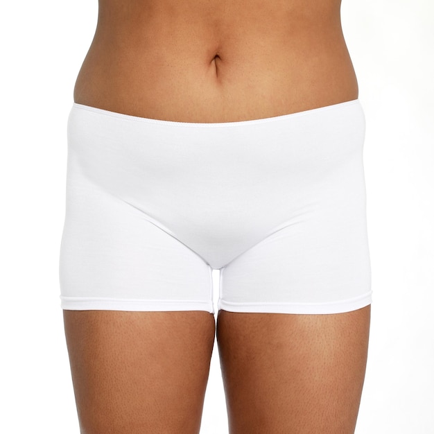 Shorts de ropa interior de mujer blanca en las caderas. braguita de niña de algodón. tangas dieta de salud de mujer Premium