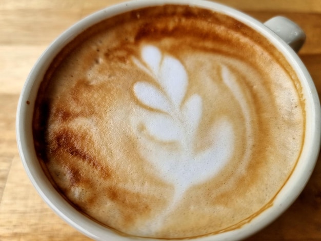 Sideway Shop Kaffee Nahaufnahme heißer Latte Art Kaffee Hintergrund