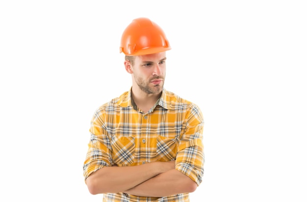 Siempre dedicado al trabajo Trabajador confiado aislado en blanco Trabajador de la construcción use casco protector Trabajo de ingeniería Trabajo de construcción Ambiente de trabajo seguro