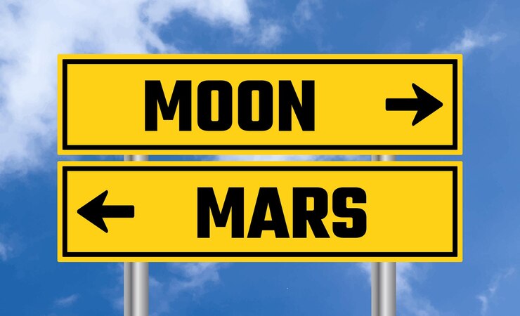 Foto signo de carretera de la luna o marte en un fondo de cielo nublado