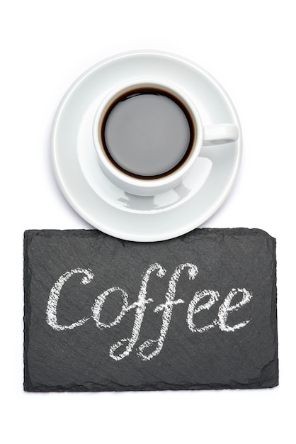 Foto signo de inscripción manuscrita de café en pizarra y taza de espresso