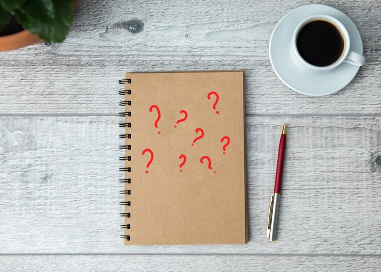 Foto signo de interrogación en el bloc de notas
