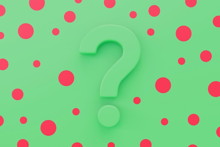 Foto signo de interrogación verde sobre un fondo verde con manchas rojas