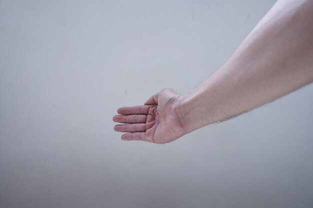 el signo de la mano para estrechar la mano