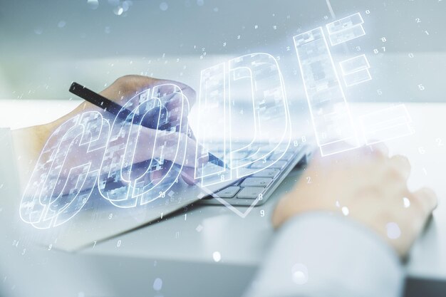 Signo de palabra de código creativo y escritura a mano en bloc de notas en el fondo con ordenador portátil concepto internacional de desarrollo de software multiexposición