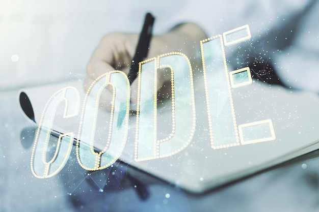 Signo de palabra de código creativo y escritura manual en el bloc de notas en el fondo concepto internacional de desarrollo de software Multiexposure